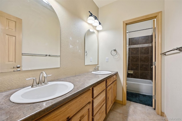 1625 N Yoder Rd, Yoder, CO 80864 - full bath featuring double vanity, tile patterned floors, tub / shower combination, and baseboards