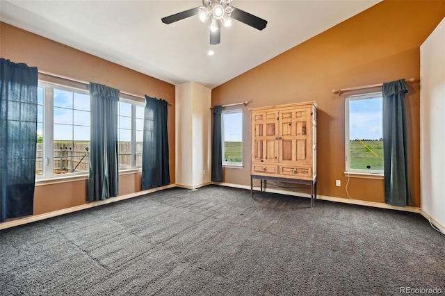 1625 N Yoder Rd, Yoder, CO 80864 - carpeted empty room with lofted ceiling, a ceiling fan, and baseboards