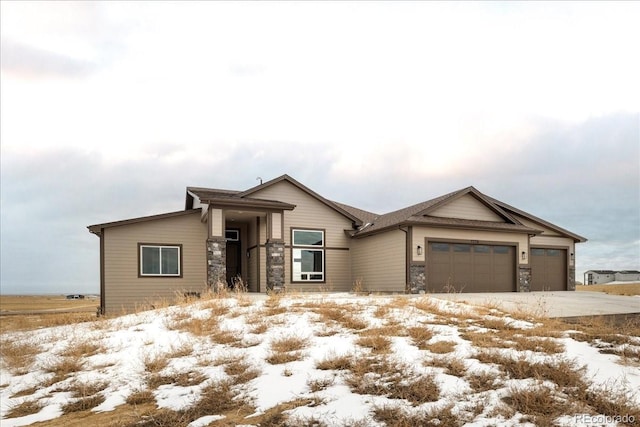 view of front of property featuring a garage