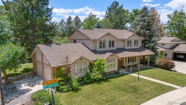 4810 W 102nd Pl, Westminster, CO 80031 - view of front of property featuring a shingled roof, board and batten siding, driveway, a front lawn, and an attached garage