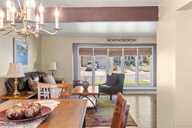 4810 W 102nd Pl, Westminster, CO 80031 - dining area featuring a chandelier and wood finished floors