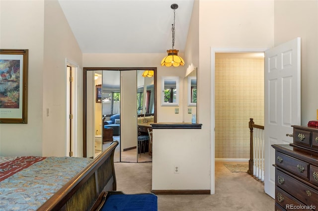 4810 W 102nd Pl, Westminster, CO 80031 - bedroom with a closet, vaulted ceiling, and light colored carpet