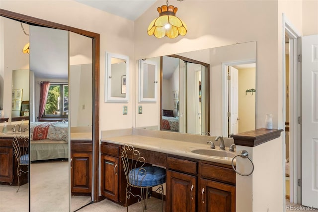 4810 W 102nd Pl, Westminster, CO 80031 - ensuite bathroom with vanity and vaulted ceiling