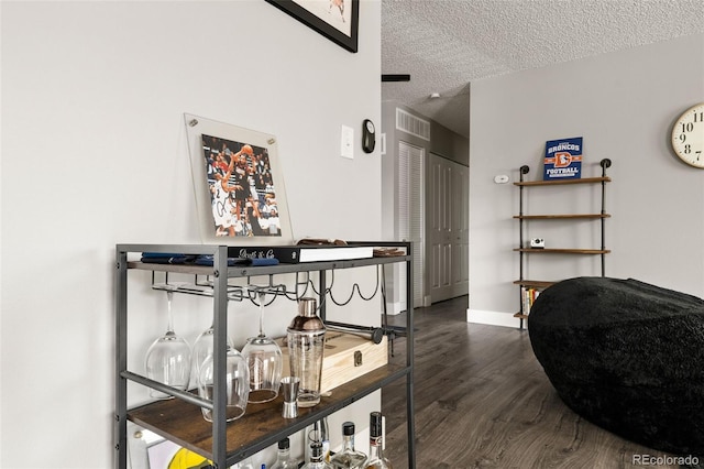 2271 Coronado Pkwy N Unit D, Denver, CO 80229 - corridor with wood finished floors, baseboards, and a textured ceiling