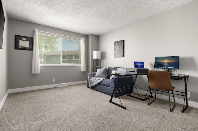 2271 Coronado Pkwy N Unit D, Denver, CO 80229 - carpeted office space featuring a textured ceiling and baseboards