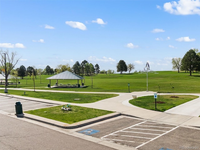 2271 Coronado Pkwy N Unit D, Denver, CO 80229 - surrounding community with a gazebo, a lawn, and uncovered parking