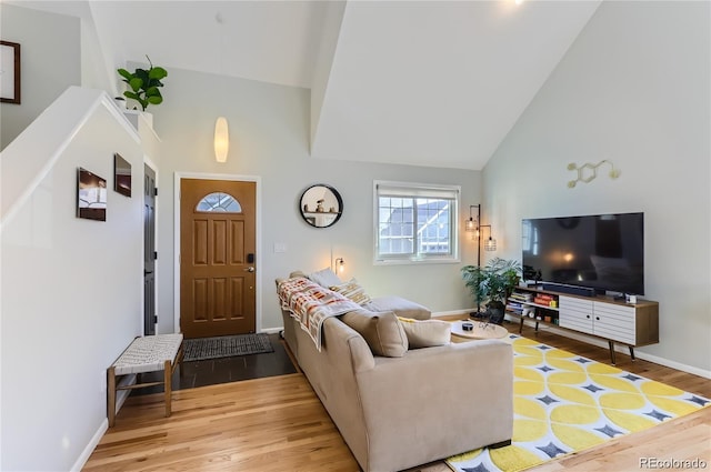 4861 Curie Ct, Boulder, CO 80301 - living area featuring high vaulted ceiling and wood finished floors