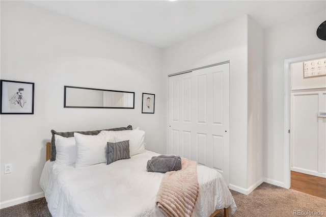 bedroom featuring a closet and carpet flooring