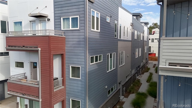 view of property exterior featuring a balcony