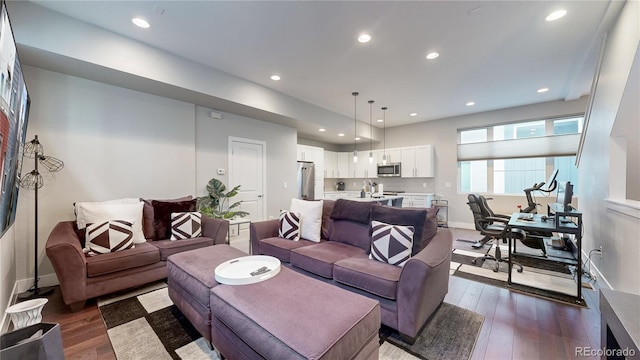 living room featuring dark hardwood / wood-style flooring