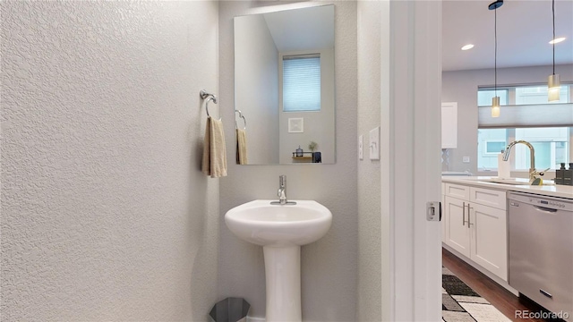 bathroom featuring hardwood / wood-style floors and sink