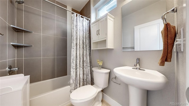 bathroom featuring shower / bath combination with curtain and toilet