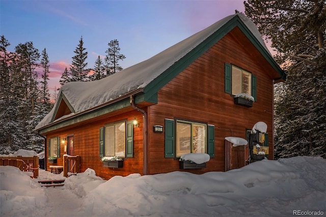 view of snow covered property