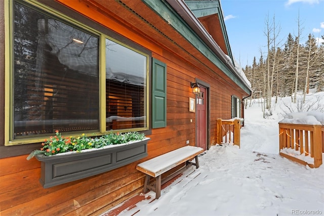 view of snow covered deck