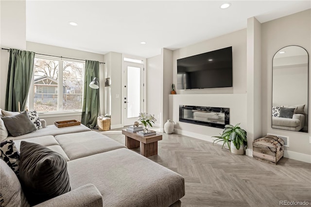 living room featuring light parquet floors