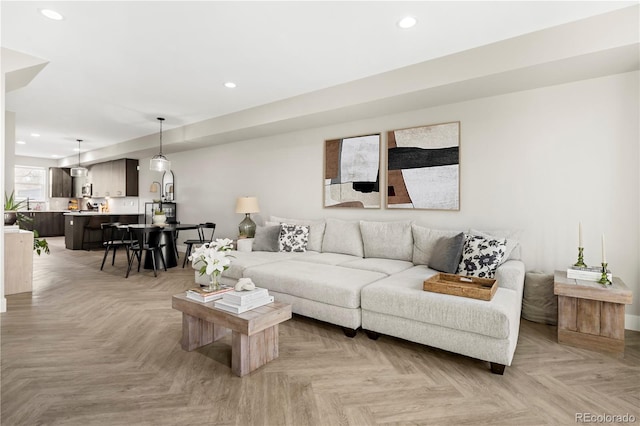 living room featuring light parquet floors