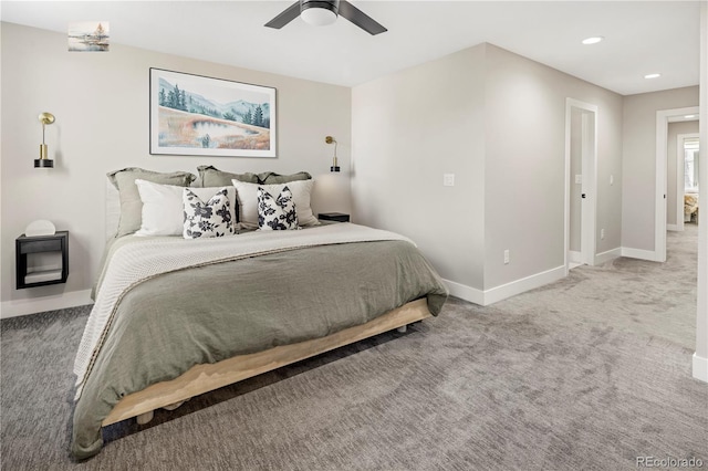 bedroom featuring ceiling fan and carpet