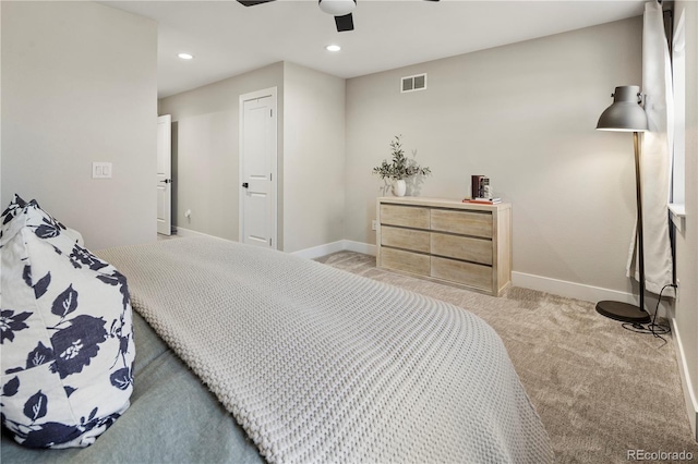 bedroom featuring ceiling fan and light colored carpet