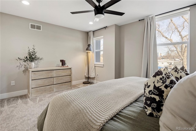 carpeted bedroom with ceiling fan