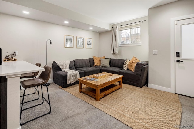 living room with light colored carpet