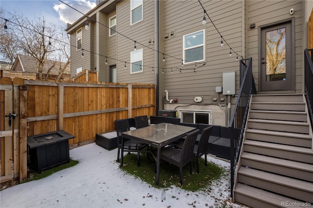 view of snow covered patio