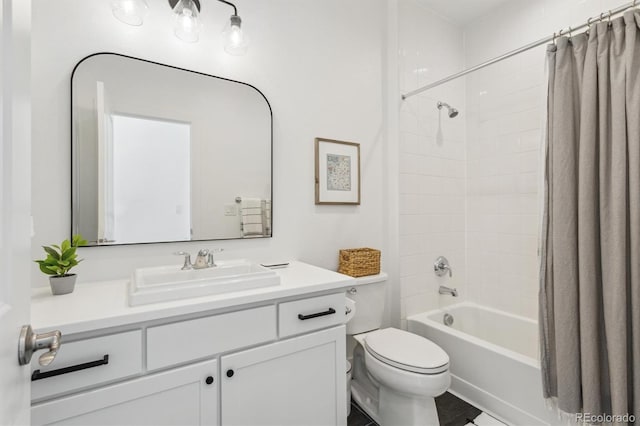 full bathroom with shower / tub combo with curtain, vanity, and toilet