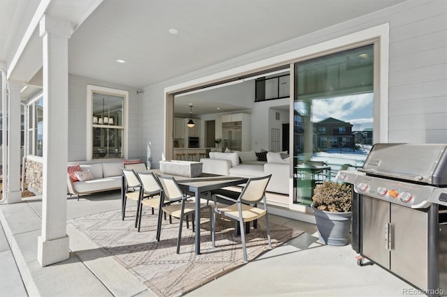 view of patio / terrace with an outdoor living space and area for grilling