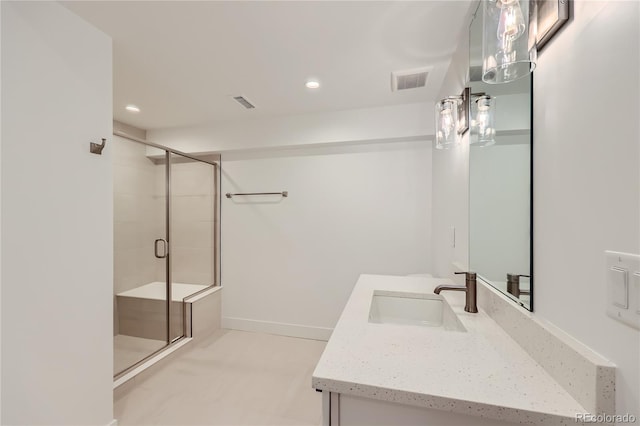 8648 Carneros Ct, Parker, CO 80138 - bathroom with vanity, a shower stall, and recessed lighting