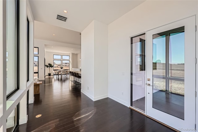 8648 Carneros Ct, Parker, CO 80138 - empty room with dark wood-type flooring and recessed lighting
