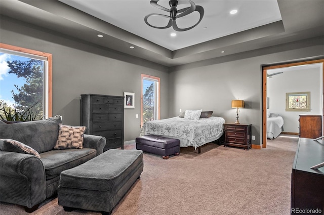 25350 Ridge Way, Golden, CO 80401 - carpeted bedroom featuring a tray ceiling, recessed lighting, and baseboards
