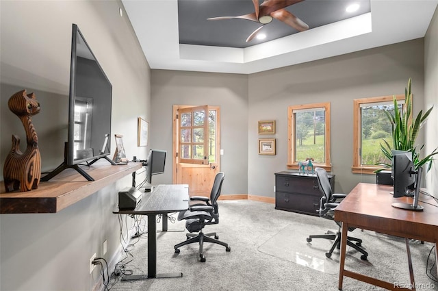 25350 Ridge Way, Golden, CO 80401 - carpeted home office featuring a ceiling fan, a raised ceiling, healthy amount of natural light, and baseboards