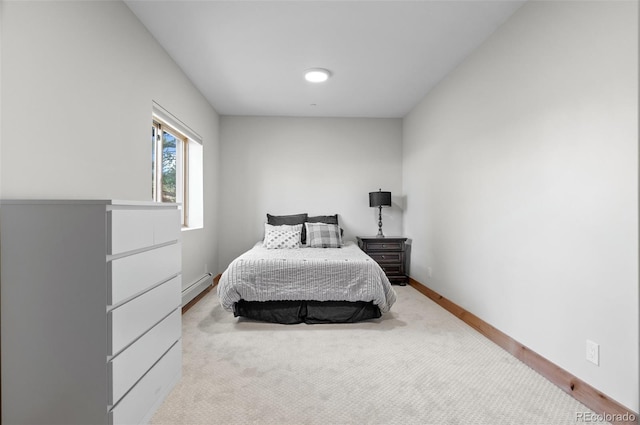 25350 Ridge Way, Golden, CO 80401 - bedroom with a baseboard radiator, carpet floors, and baseboards