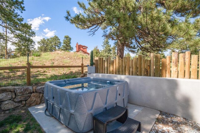 25350 Ridge Way, Golden, CO 80401 - view of patio with a hot tub