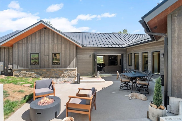 25350 Ridge Way, Golden, CO 80401 - view of patio featuring an outdoor fire pit and outdoor dining space