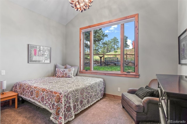 25350 Ridge Way, Golden, CO 80401 - carpeted bedroom featuring lofted ceiling and a chandelier