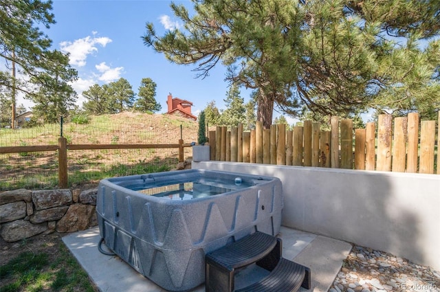 25350 Ridge Way, Golden, CO 80401 - view of patio with a hot tub