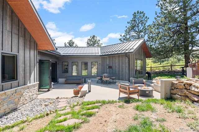 25350 Ridge Way, Golden, CO 80401 - view of patio with a fire pit