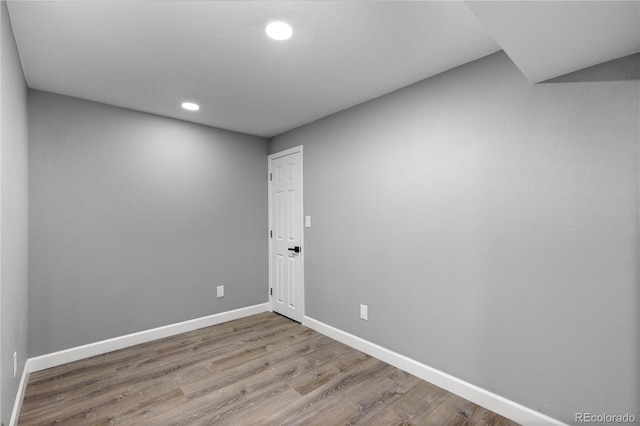 unfurnished room featuring light hardwood / wood-style flooring