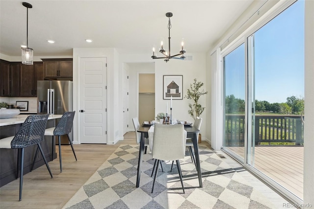2515 Clayton Cir, Superior, CO 80027 - dining room with a chandelier, light wood-type flooring, and recessed lighting