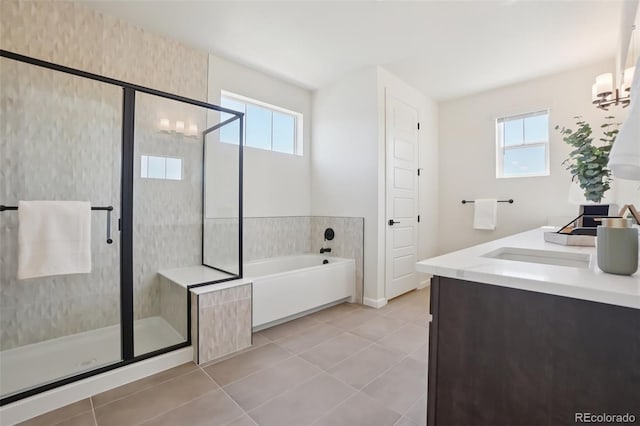 2515 Clayton Cir, Superior, CO 80027 - full bath featuring a garden tub, a shower stall, plenty of natural light, and tile patterned flooring