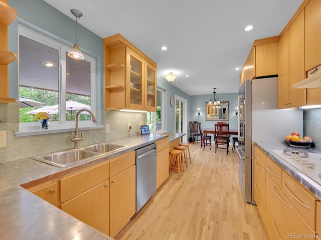 595 W Lake Ave, Littleton, CO 80120 - kitchen featuring dishwasher, open shelves, a sink, plenty of natural light, and recessed lighting