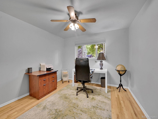 595 W Lake Ave, Littleton, CO 80120 - office area with light wood-style flooring, ceiling fan, and baseboards