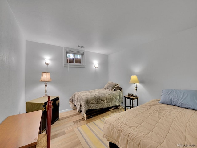595 W Lake Ave, Littleton, CO 80120 - bedroom featuring wood finished floors and baseboards