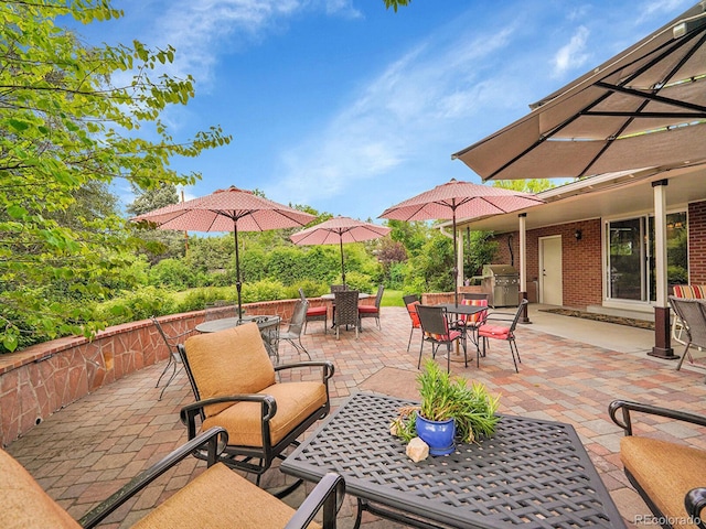 595 W Lake Ave, Littleton, CO 80120 - view of patio featuring outdoor dining space and area for grilling