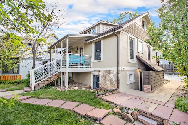 2507 9th St, Boulder, CO 80304 - back of property with stucco siding and stairs
