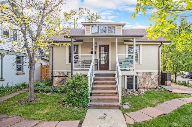 2507 9th St, Boulder, CO 80304 - bungalow-style home with stone siding, stucco siding, a shingled roof, covered porch, and stairs