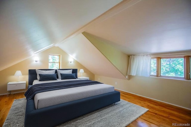 2507 9th St, Boulder, CO 80304 - bedroom with wood finished floors and lofted ceiling