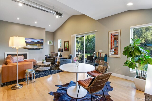 357 Pascal St, Fort Collins, CO 80524 - dining space with wood finished floors, recessed lighting, baseboards, and high vaulted ceiling
