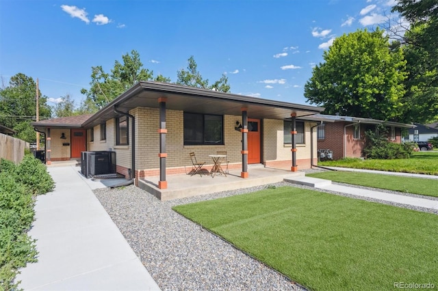 1112-11121/2 Krameria St, Denver, CO 80220 - single story home with a front lawn, brick siding, and covered porch