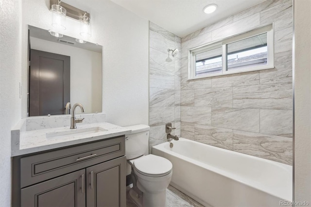 1112-11121/2 Krameria St, Denver, CO 80220 - bathroom with vanity and tub / shower combination